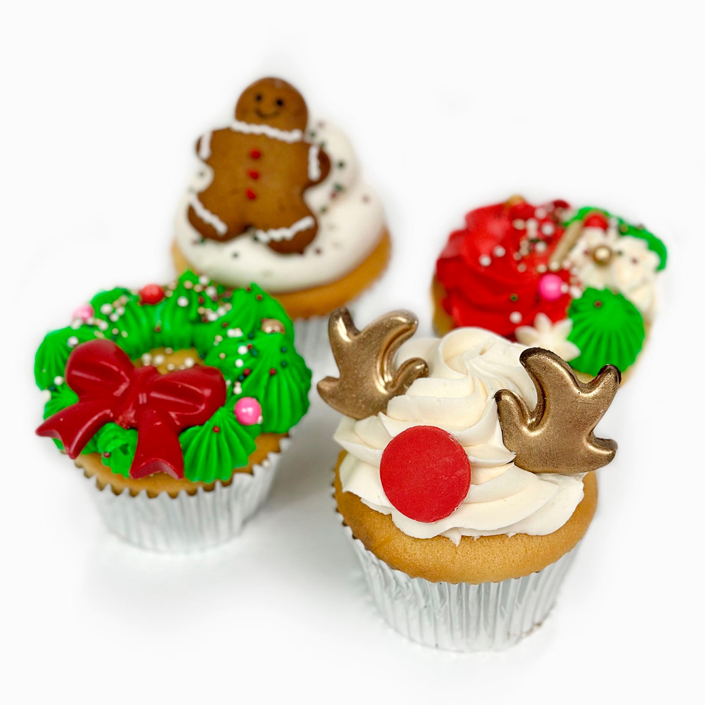 Four Holiday Cupcake; Rudolph, Christmas reef, Gingerbread Man, and Christmas decor