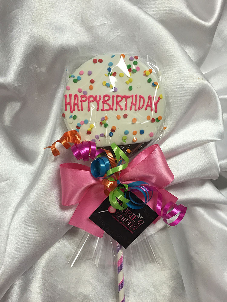 White Chocolate Happy Birthday Lolly wrapped in cellophane with a ribbon