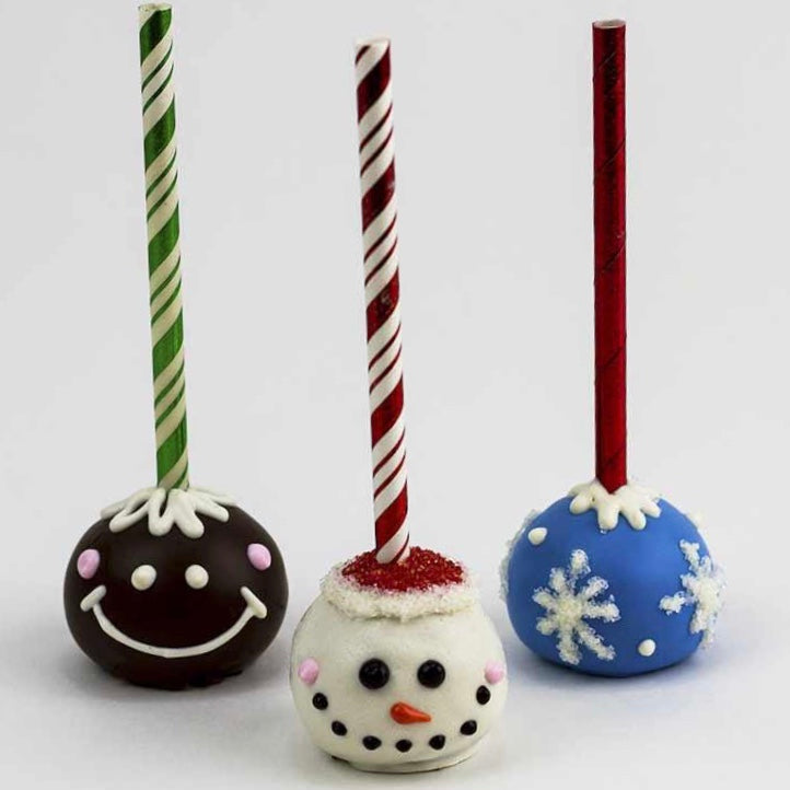 Snowman, blue and white Snowflake, and brown Gingerbread Man cake pops