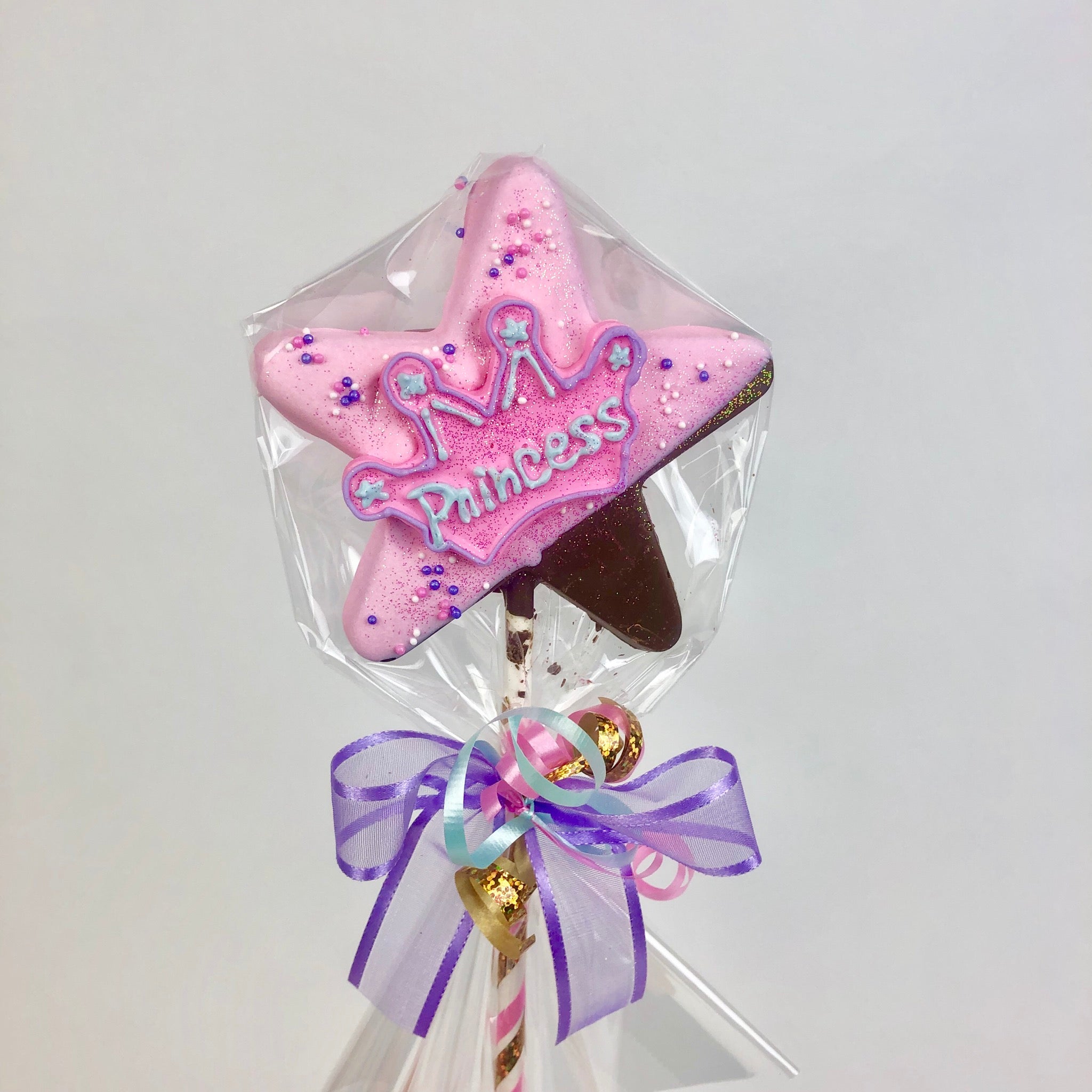 Princess Lolly wrapped in cellophane with a ribbons