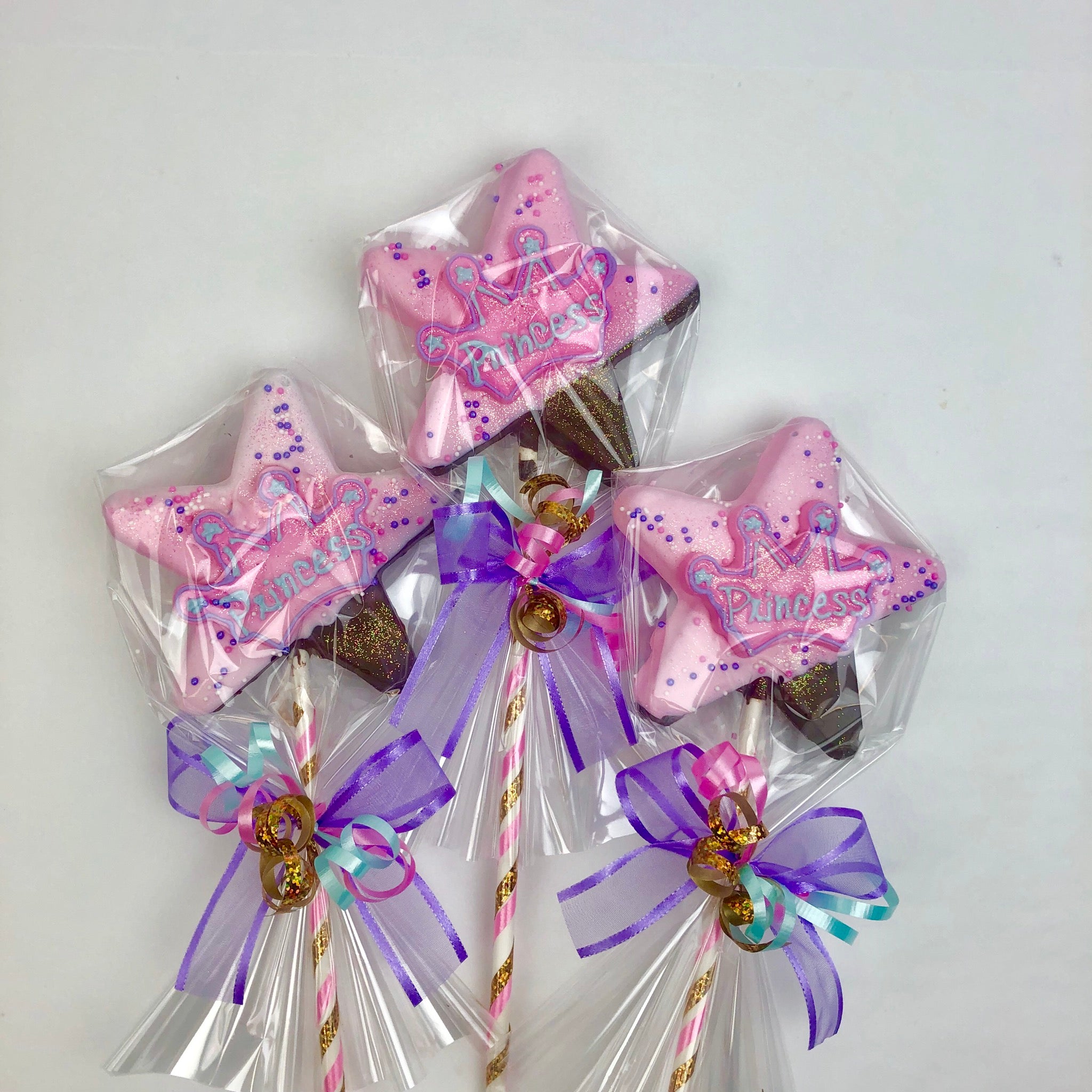 Princess Lolly wrapped in cellophane with a ribbons