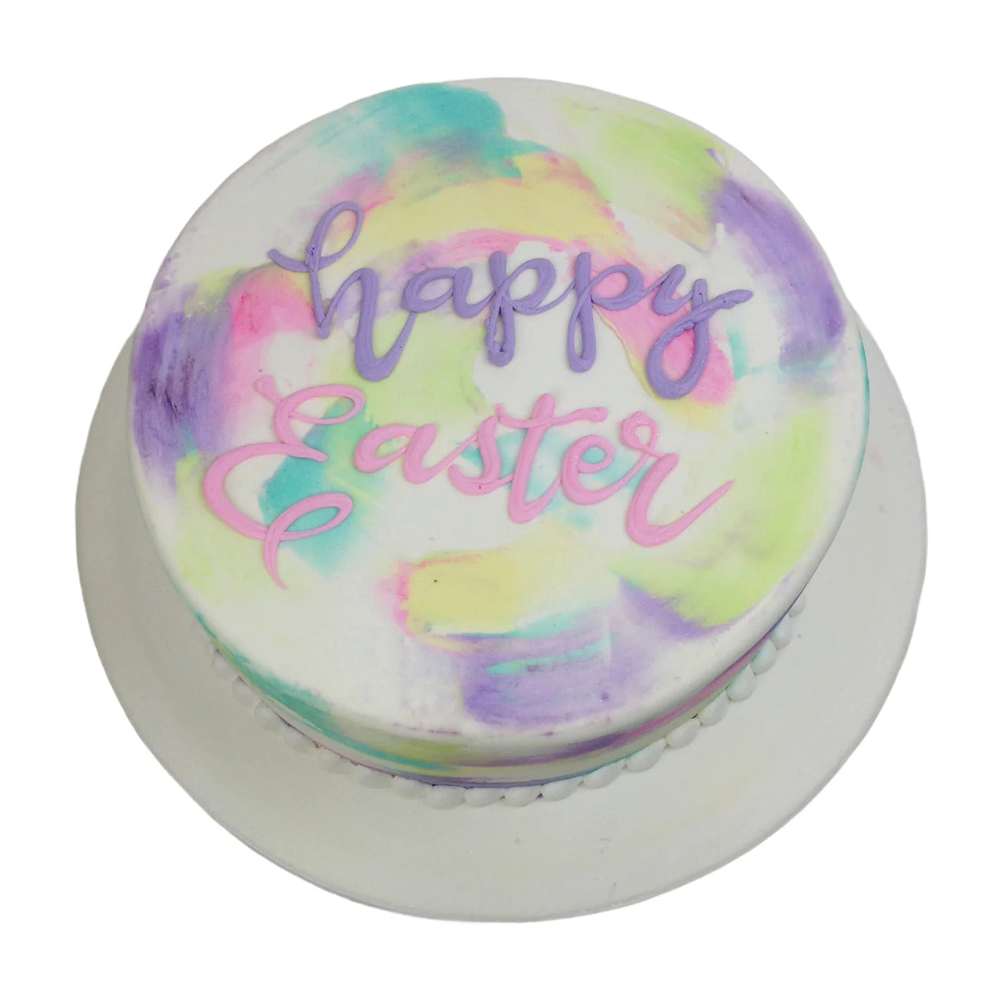 The top view of a white cake decorated with pastel buttercream design for Easter.