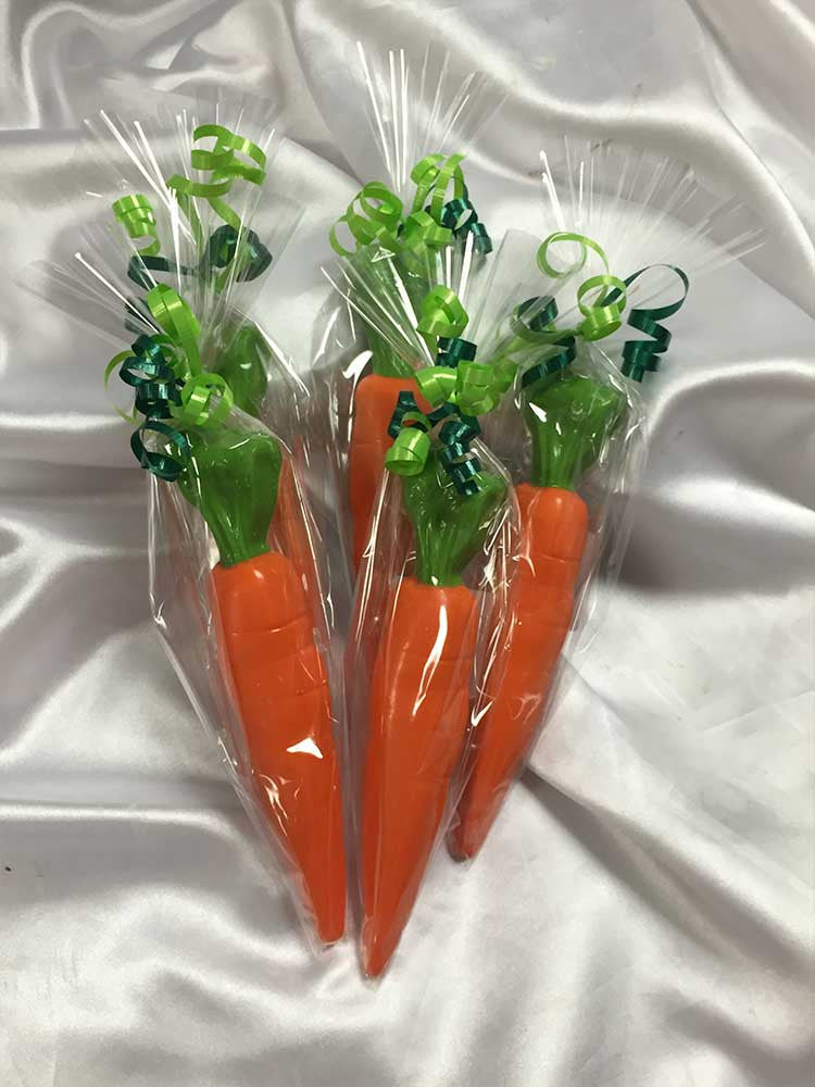 Chocolate Carrots warped in cellophane with ribbons