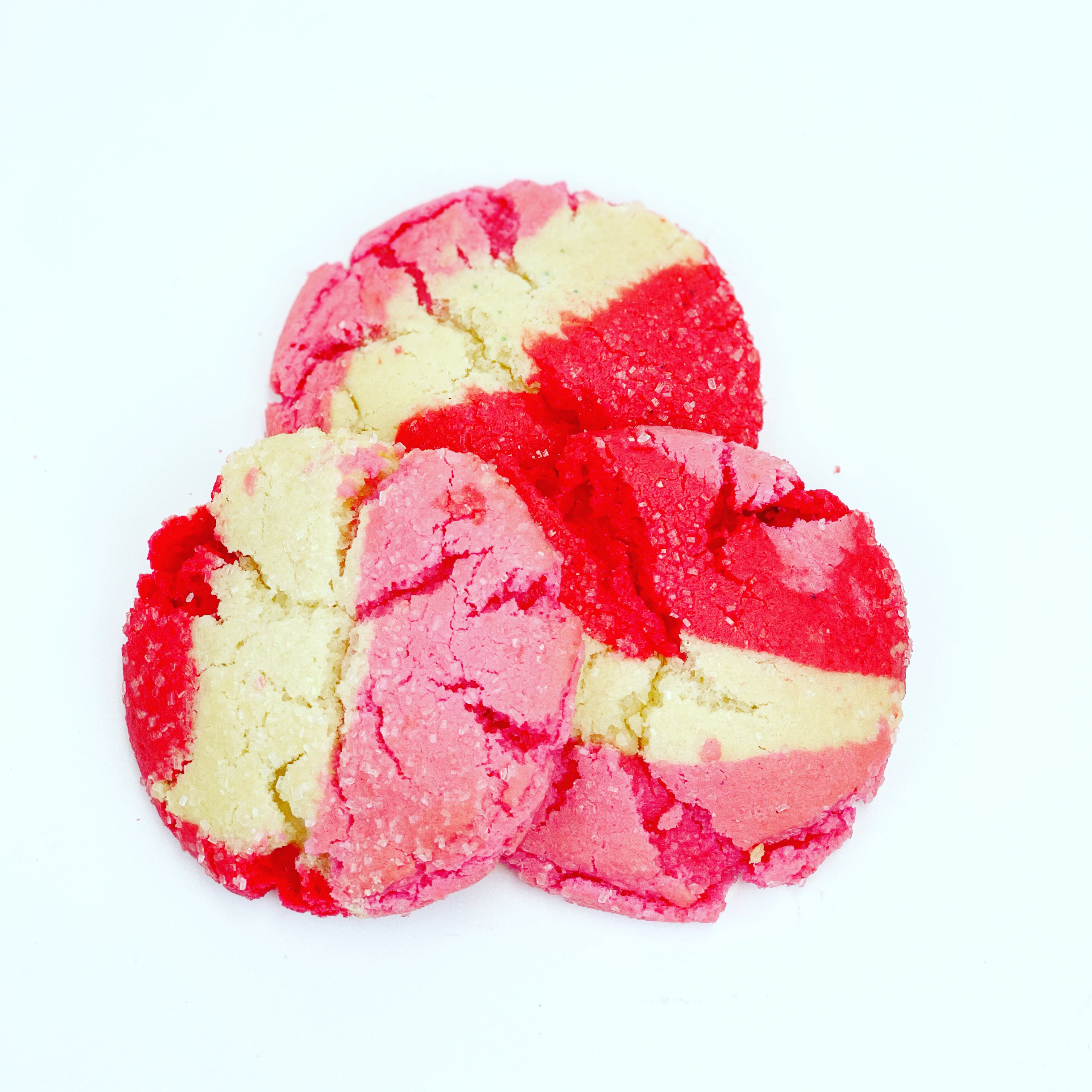 Three white, red and pink colored Valentine's Sugar Cookies