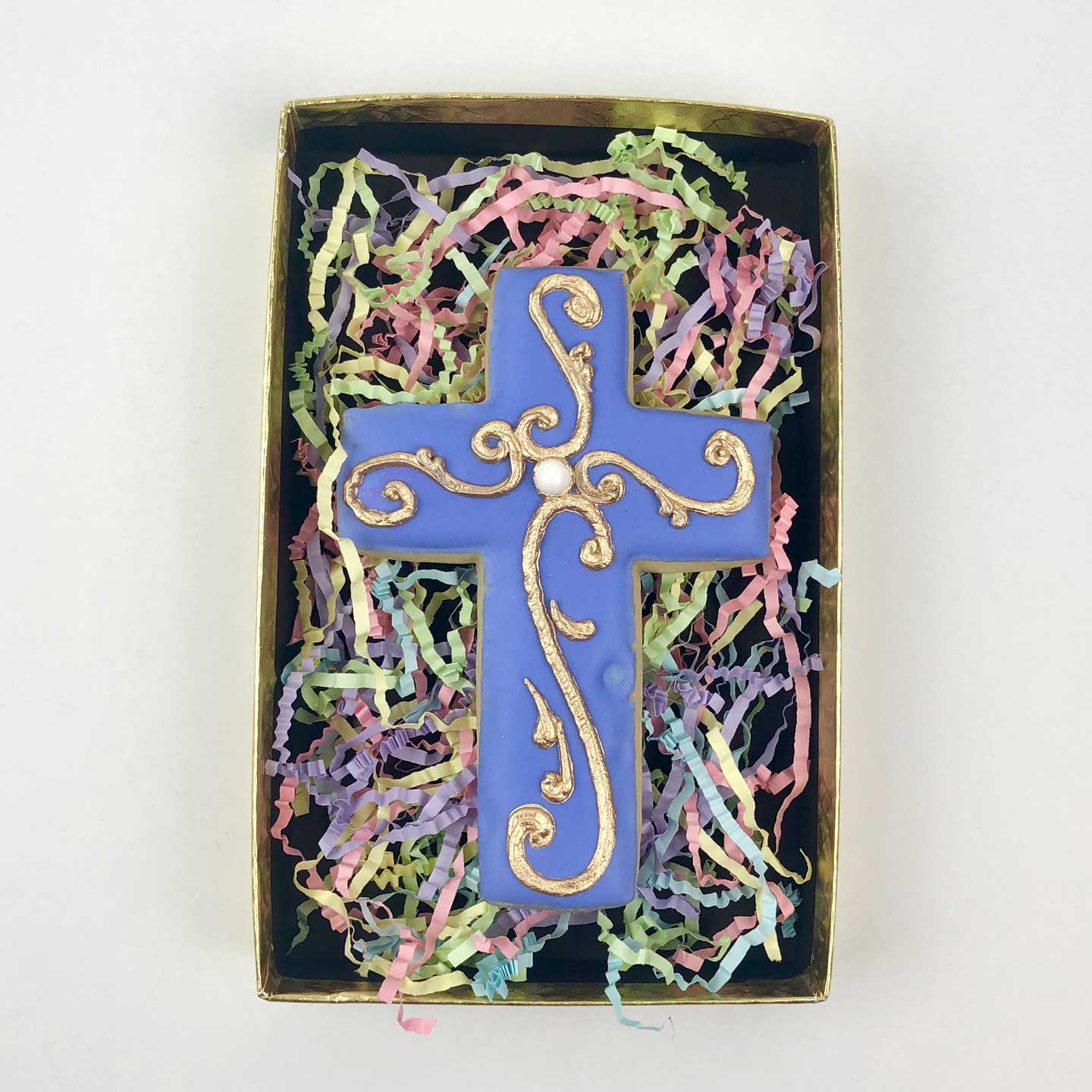 Decorated lavender Cross Cookie in a box