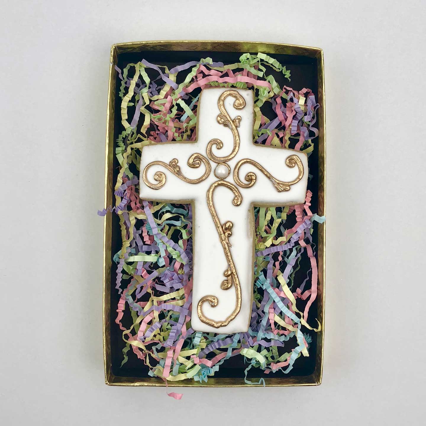Decorated white Cross Cookie in a box