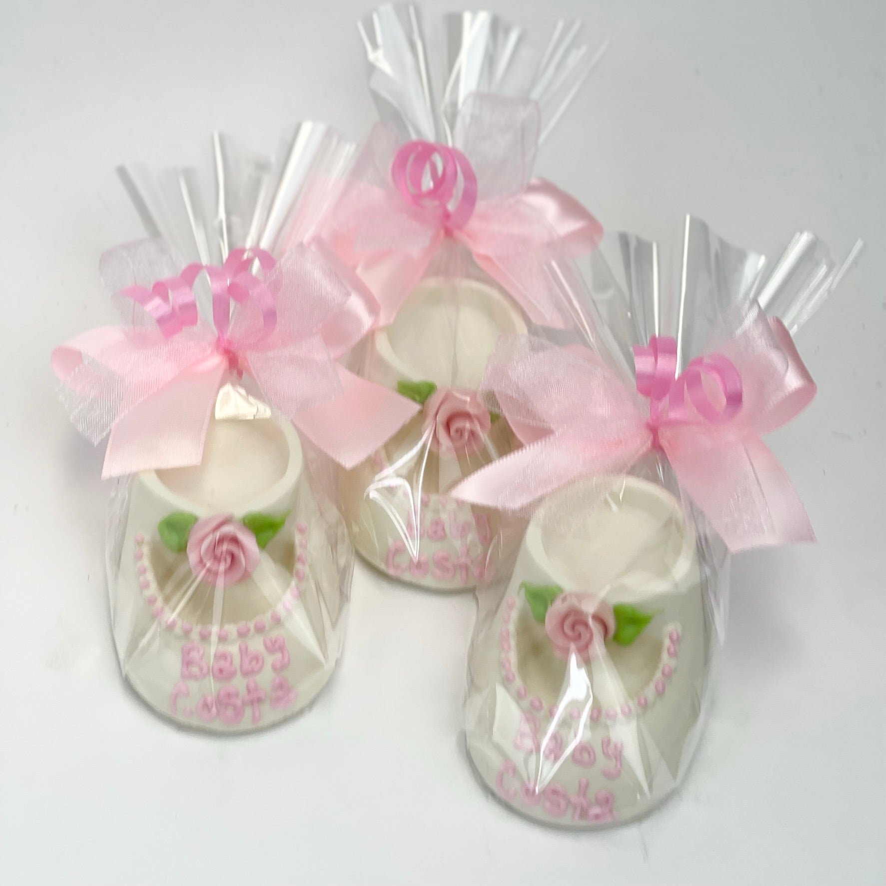White Chocolate Baby Bootie warped in cellophane with a ribbon