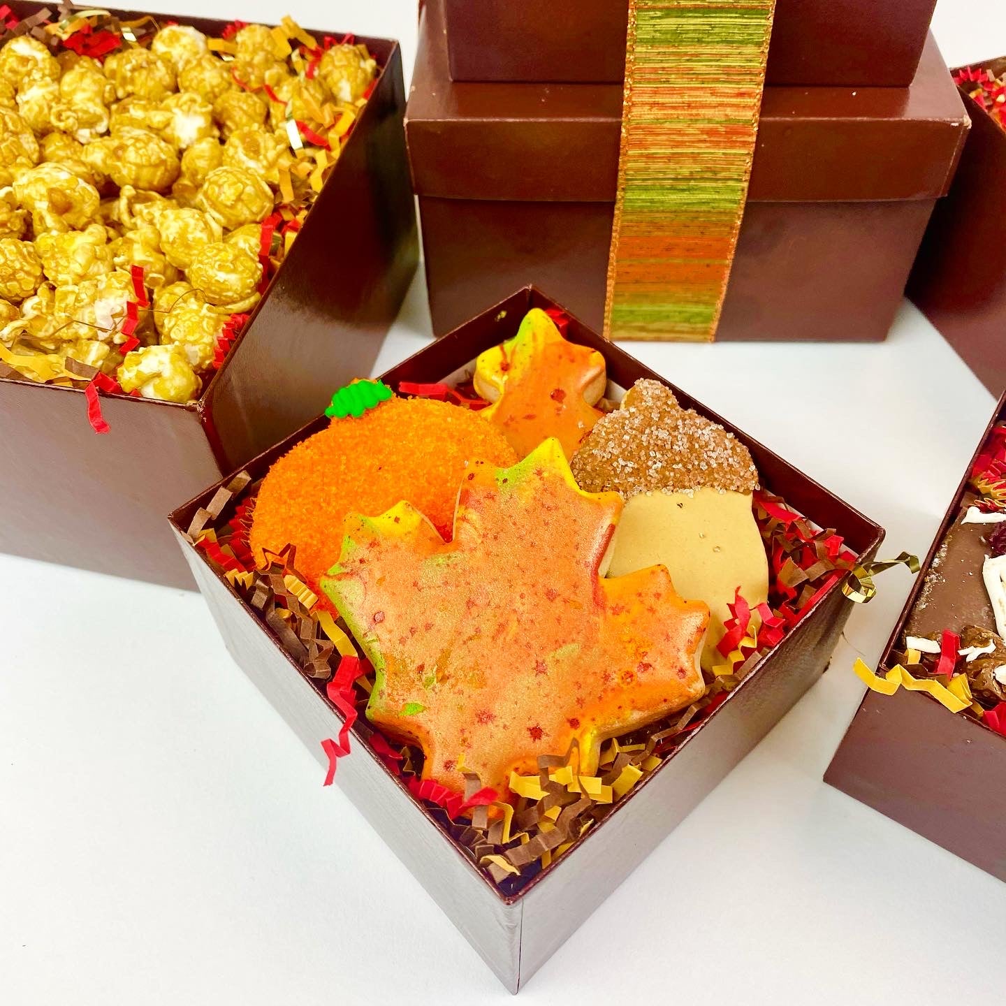 box with decorated fall sugar cookies