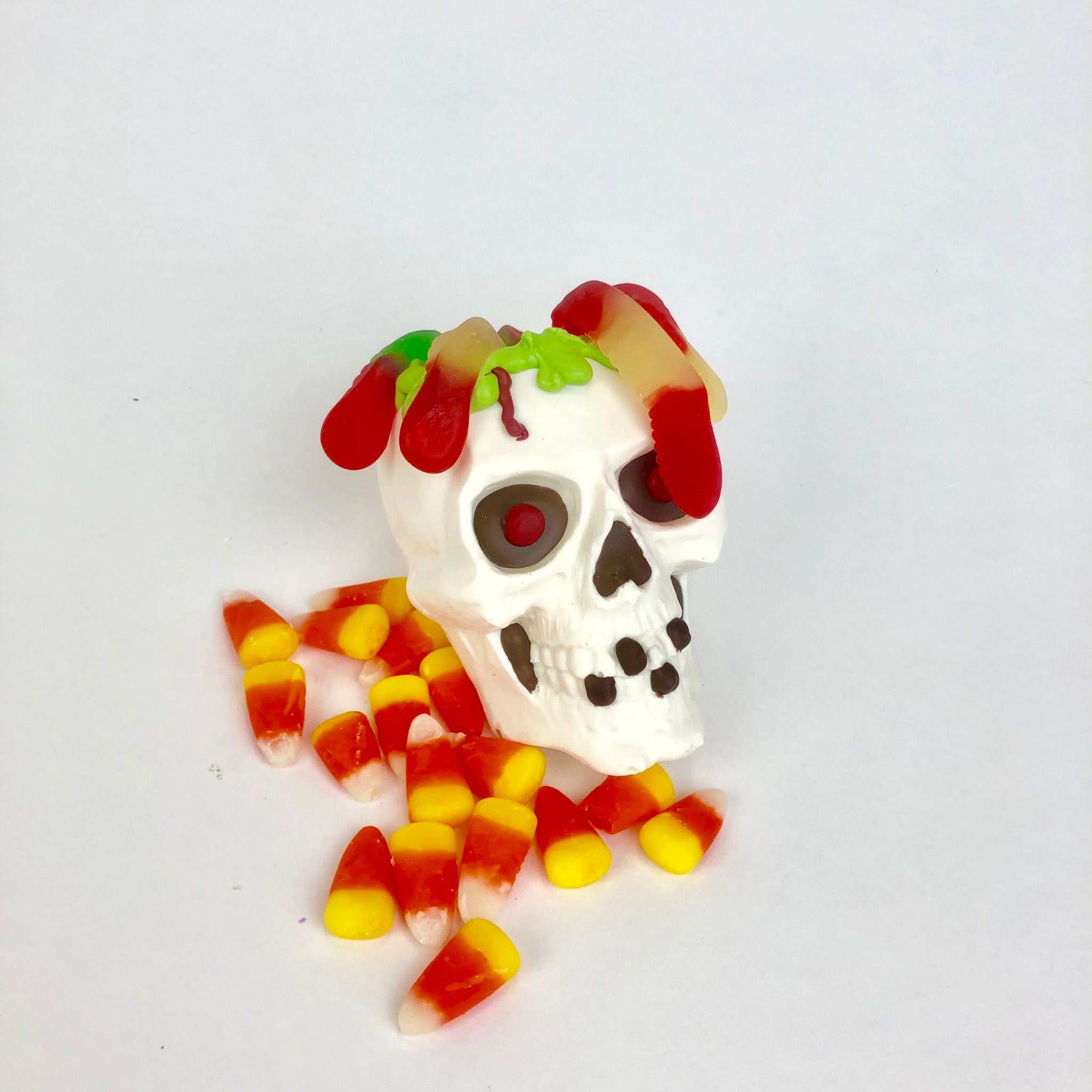 White Chocolate 3D Skull with gummy worms and candy corn