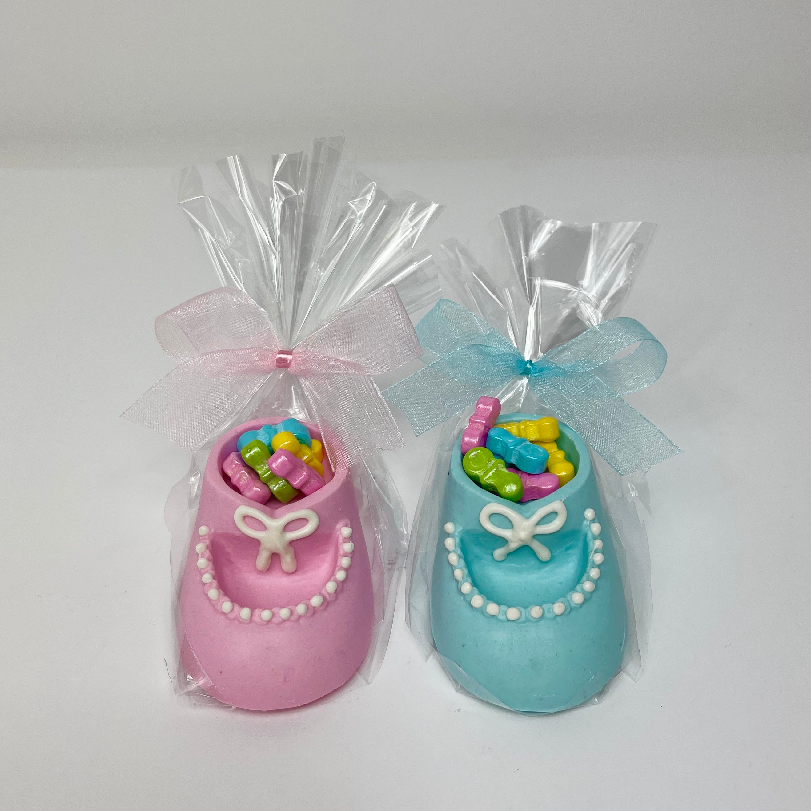 Blue and pink Chocolate Baby Booties warped in cellophane with ribbons