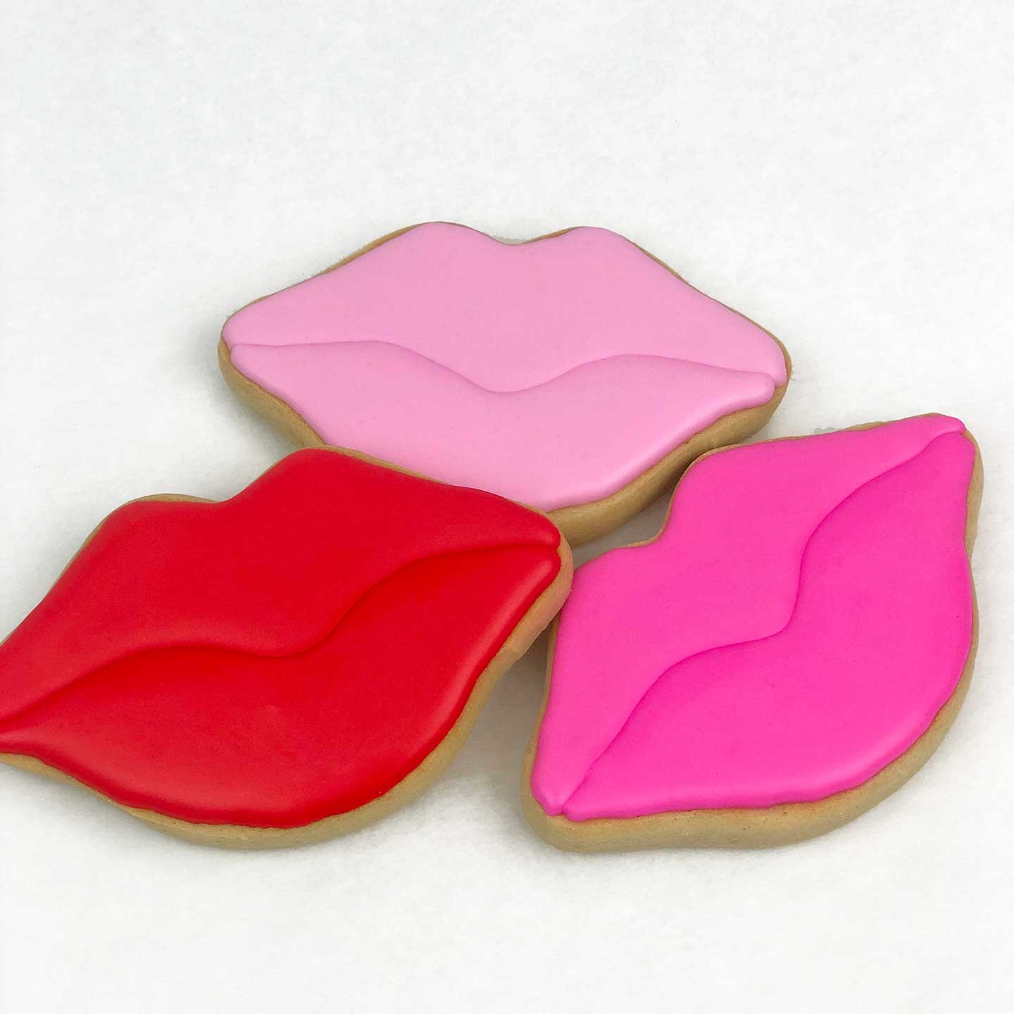 Lip Cookies in red, light pink, hot pink colors